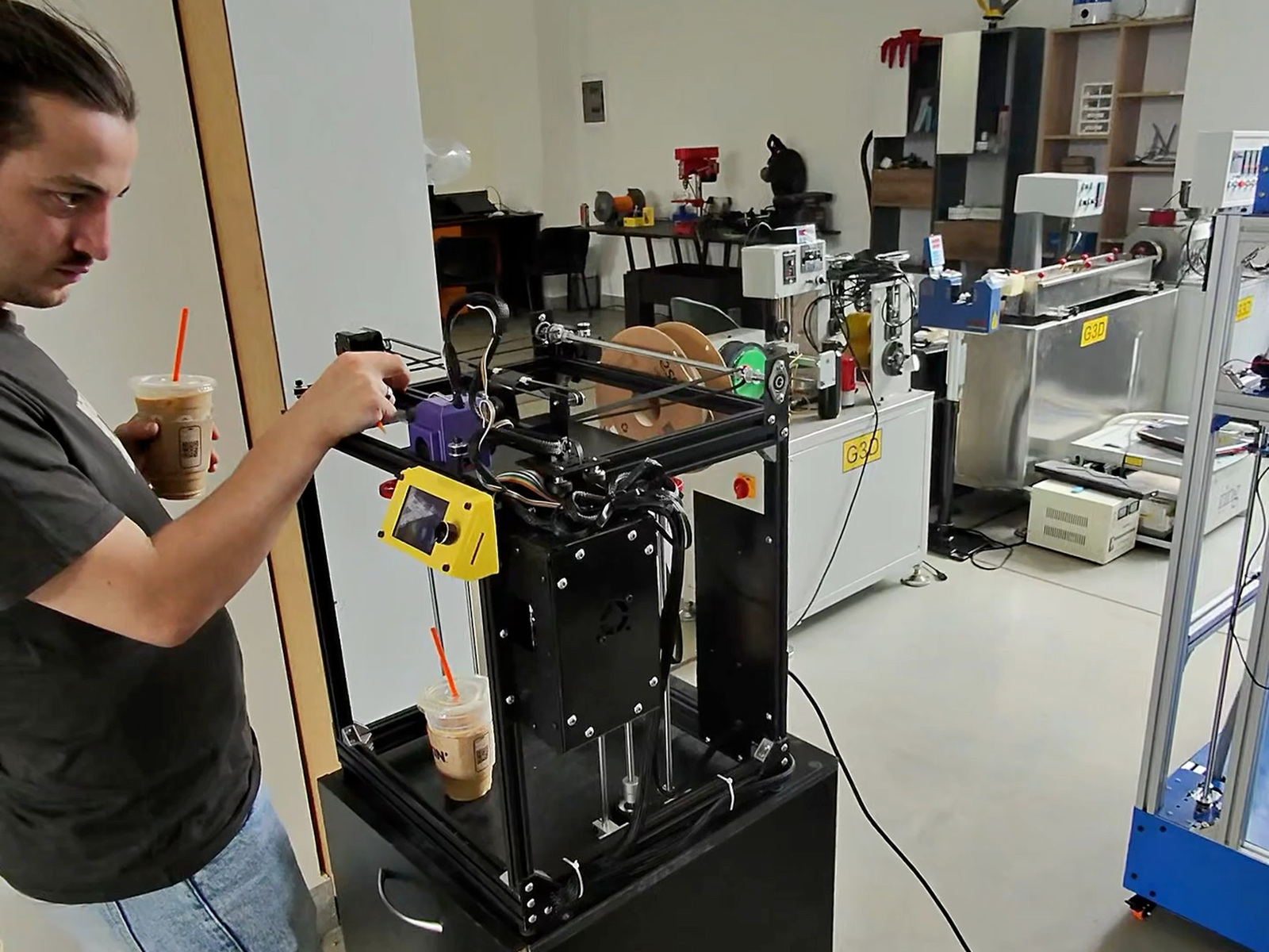 A G3D engineer setting up a machine